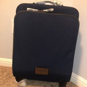 BLACK FRIDAY SAL BRAND NEW Coach rolling luggage
